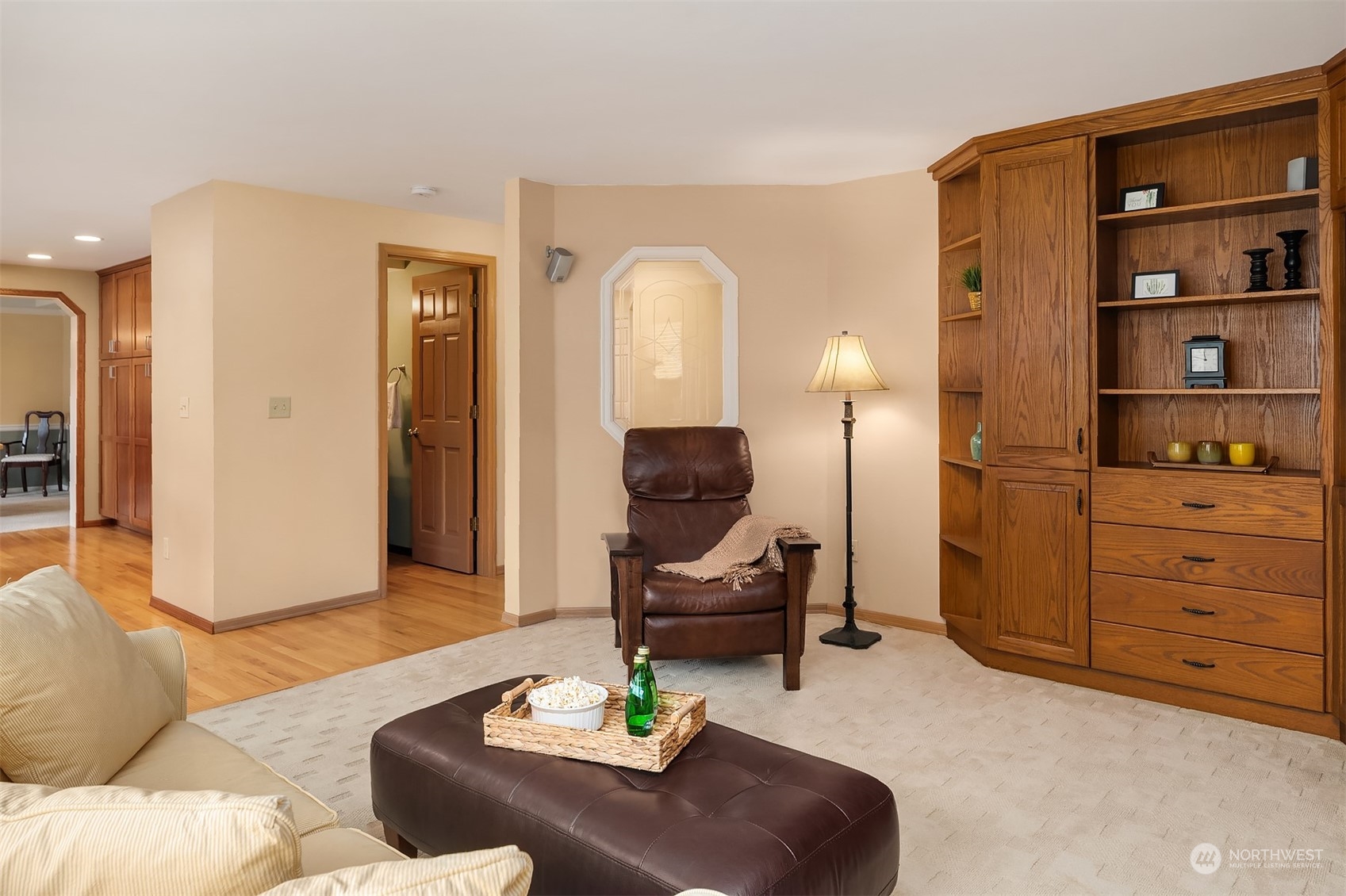 2224 237th Place Southeast Bothell, WA 98021 - Photo 16 of 40 a living room with furniture and a dresser