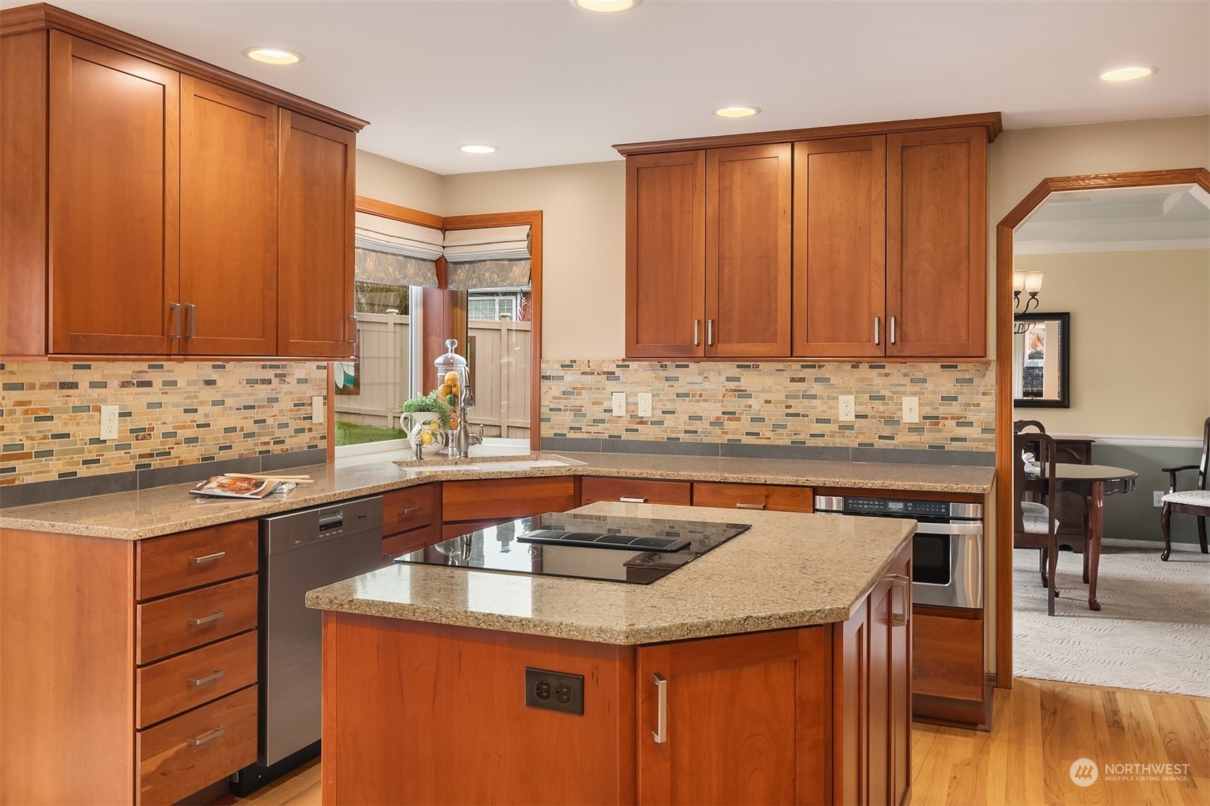 2224 237th Place Southeast Bothell, WA 98021 - Photo 19 of 40 a kitchen with a sink stove and cabinets