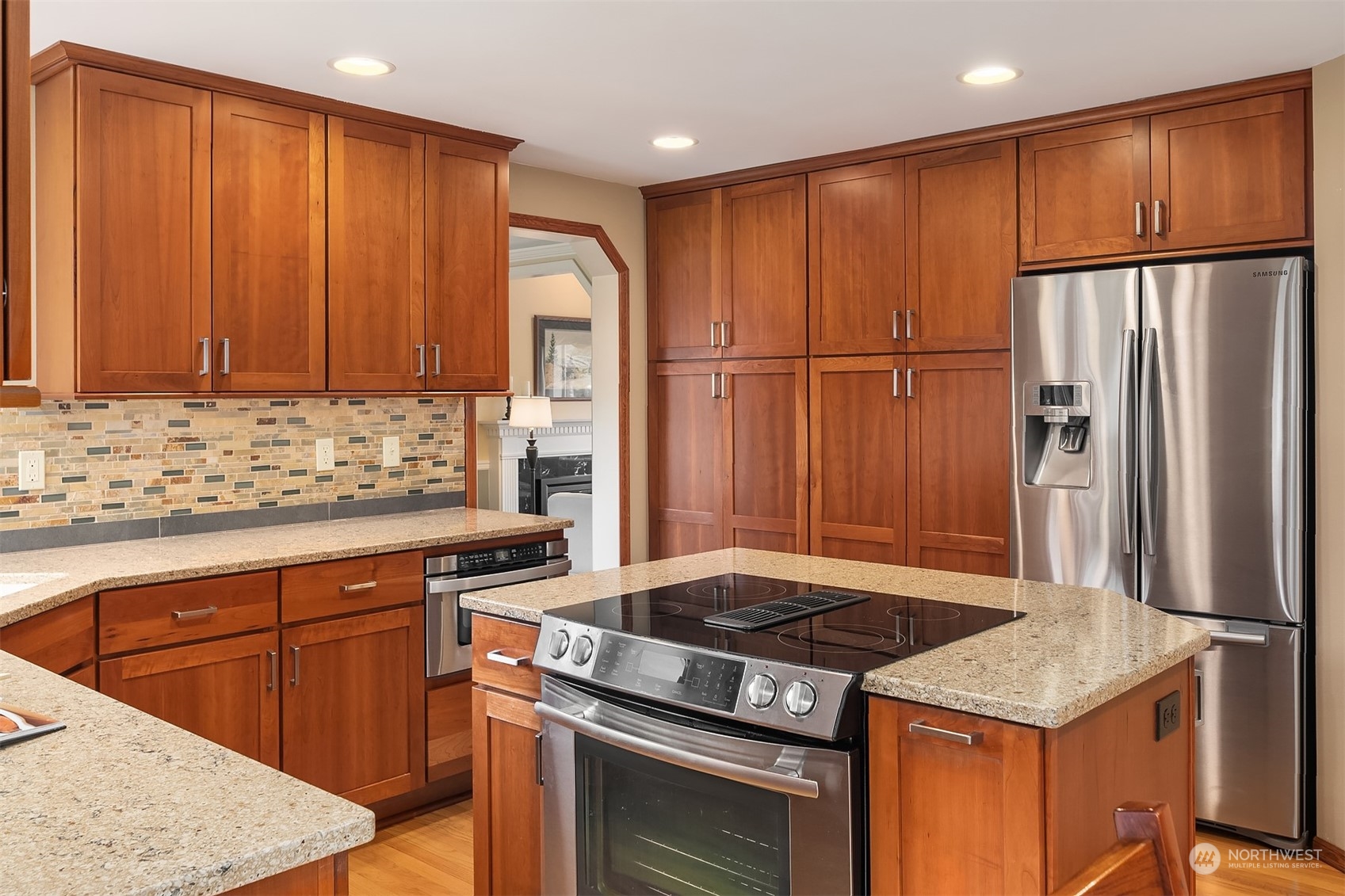 2224 237th Place Southeast Bothell, WA 98021 - Photo 20 of 40 a kitchen with stainless steel appliances granite countertop a refrigerator stove sink and cabinets