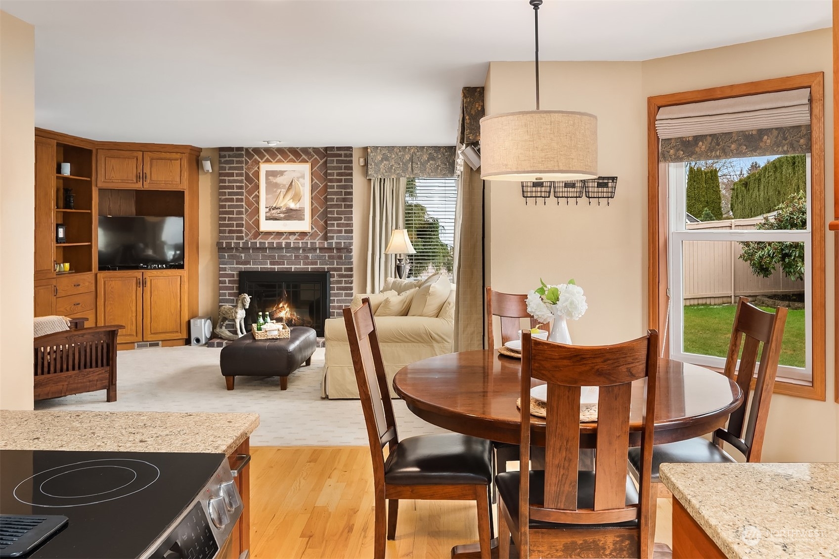 2224 237th Place Southeast Bothell, WA 98021 - Photo 21 of 40 a view of a dining room with furniture window and outside view