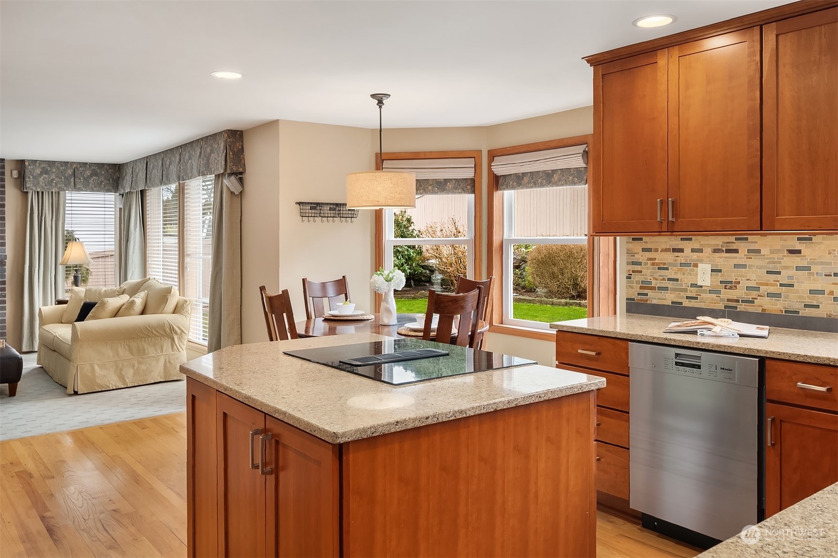 2224 237th Place Southeast Bothell, WA 98021 - Photo 22 of 40 a kitchen with stainless steel appliances granite countertop a sink a stove and a refrigerator