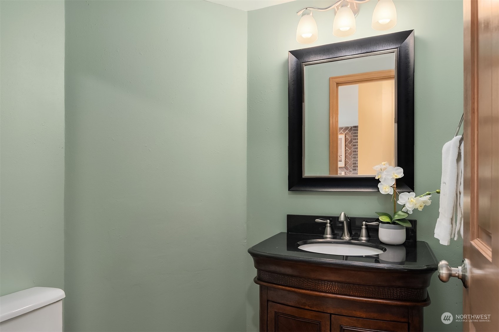 2224 237th Place Southeast Bothell, WA 98021 - Photo 26 of 40 a bathroom with a sink and a mirror