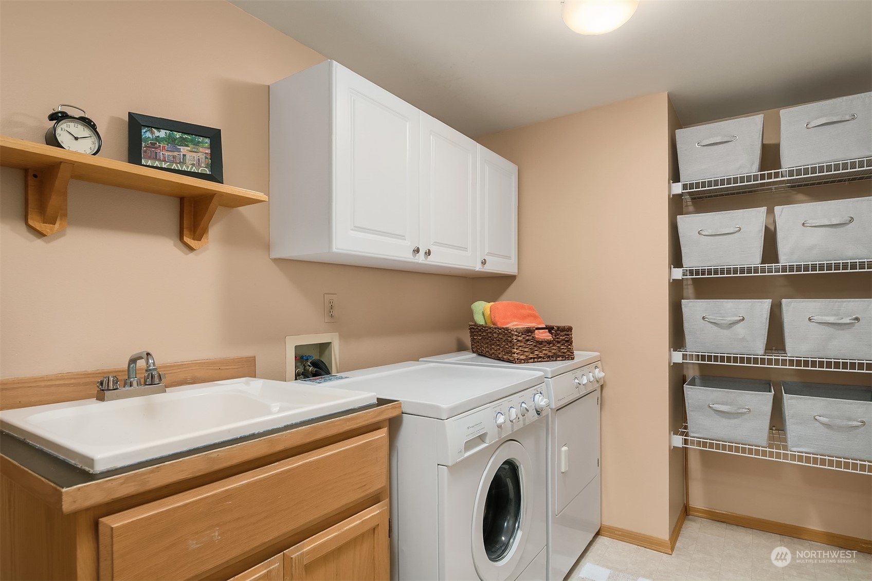 2224 237th Place Southeast Bothell, WA 98021 - Photo 27 of 40 a utility room with dryer and washer