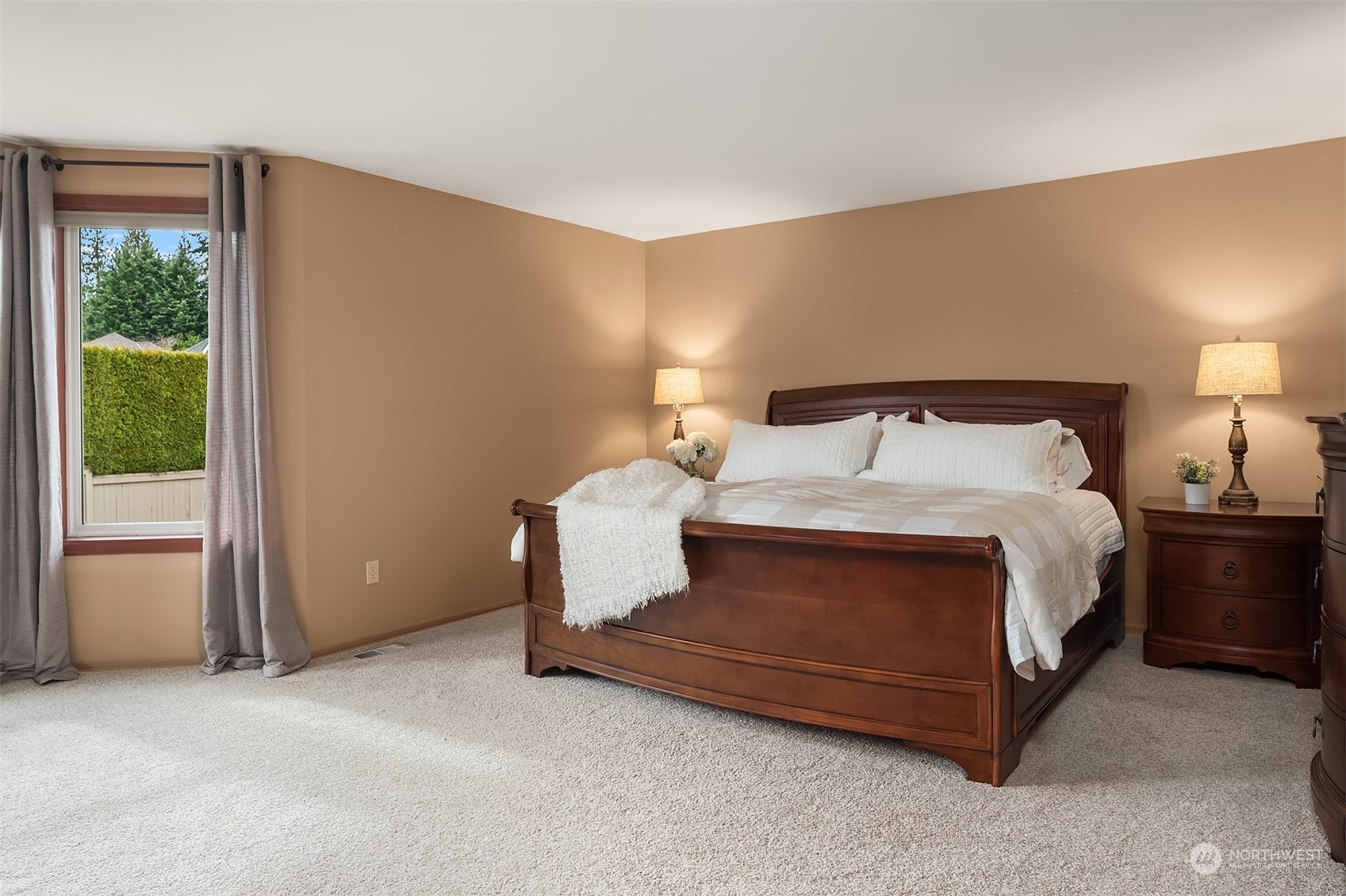 2224 237th Place Southeast Bothell, WA 98021 - Photo 29 of 40 a bed sitting in a room next to a window