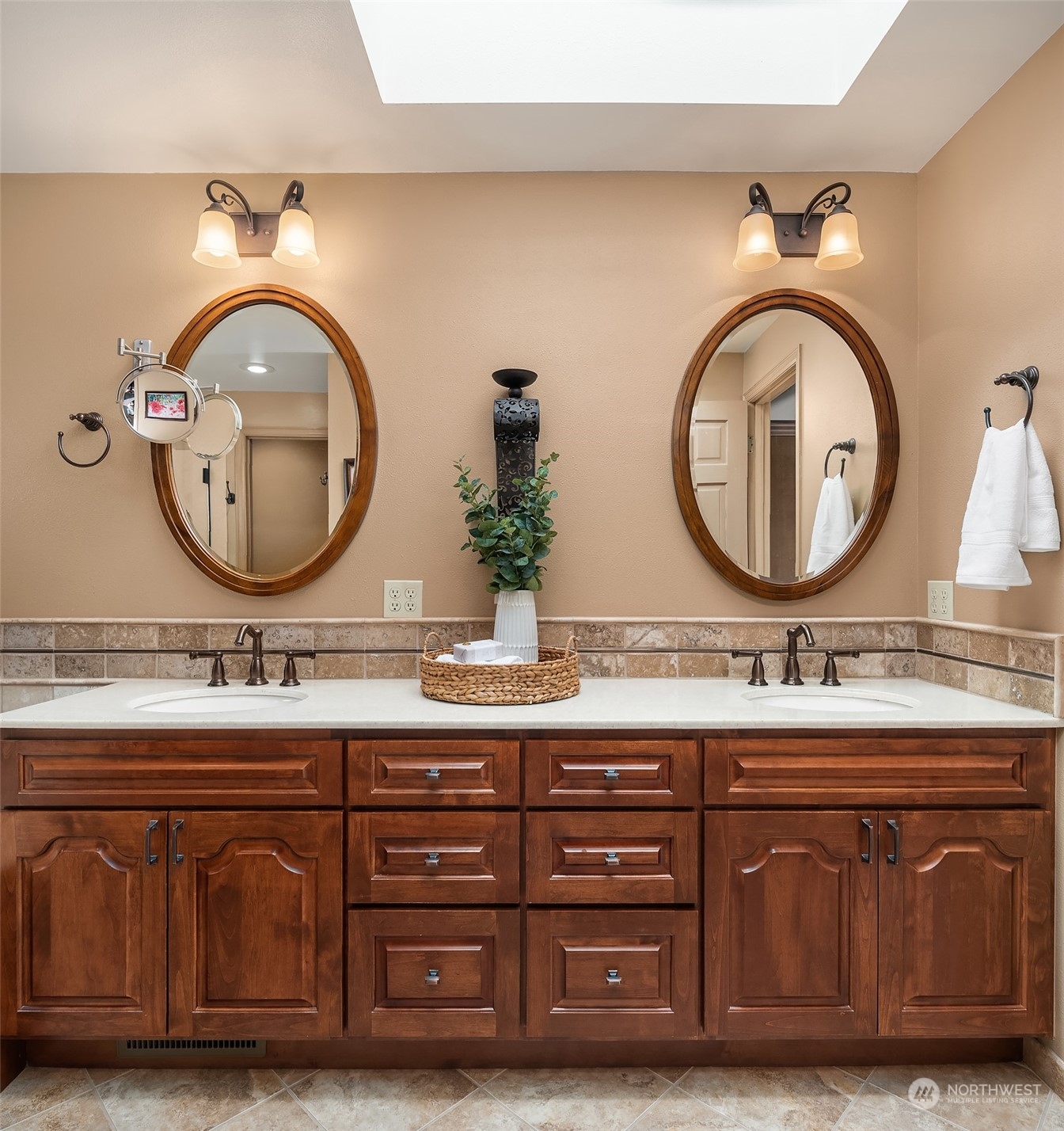 2224 237th Place Southeast Bothell, WA 98021 - Photo 31 of 40 a bathroom with a granite countertop double vanity and a mirror
