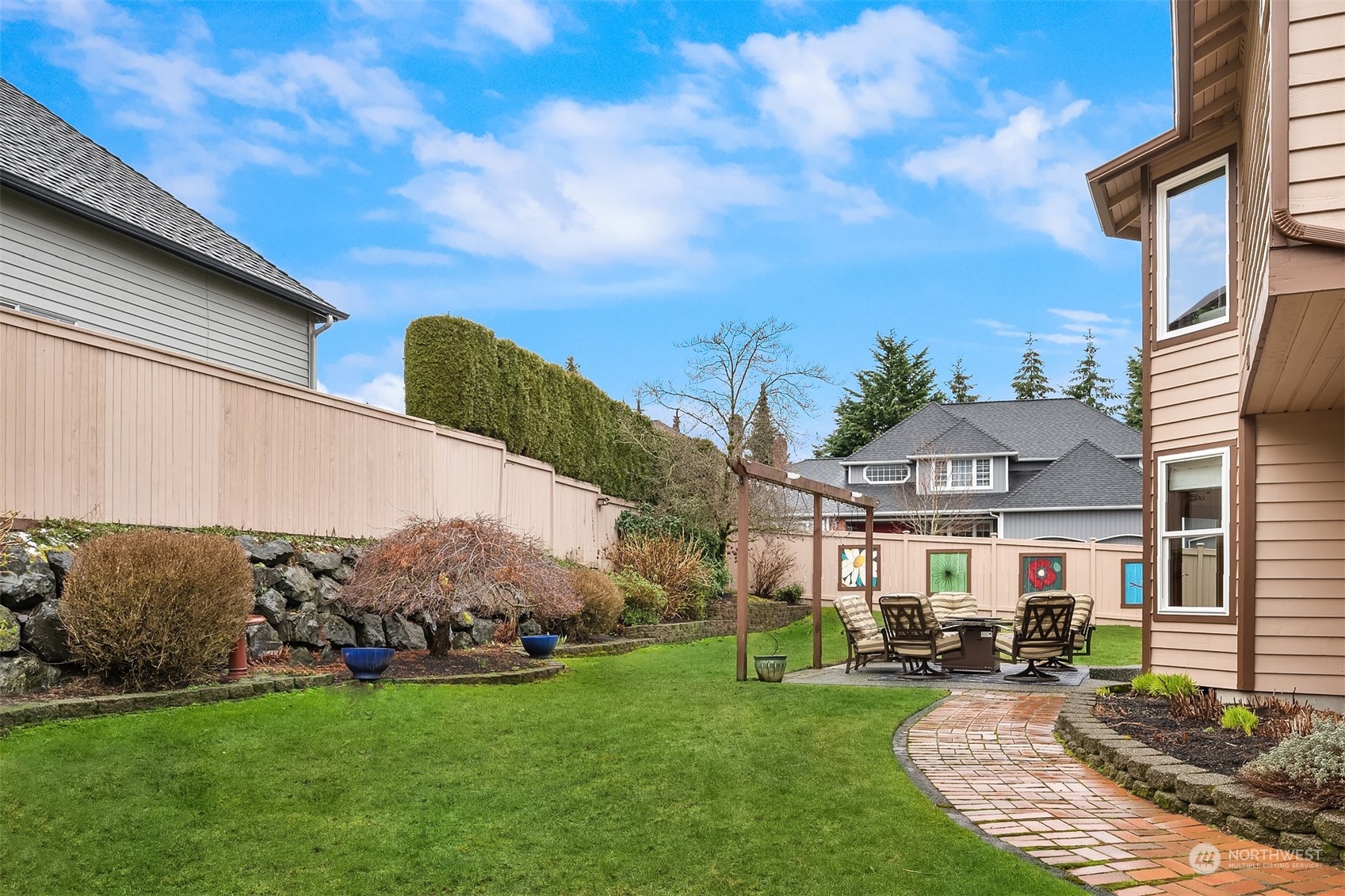 2224 237th Place Southeast Bothell, WA 98021 - Photo 39 of 40 a front view of a house with garden