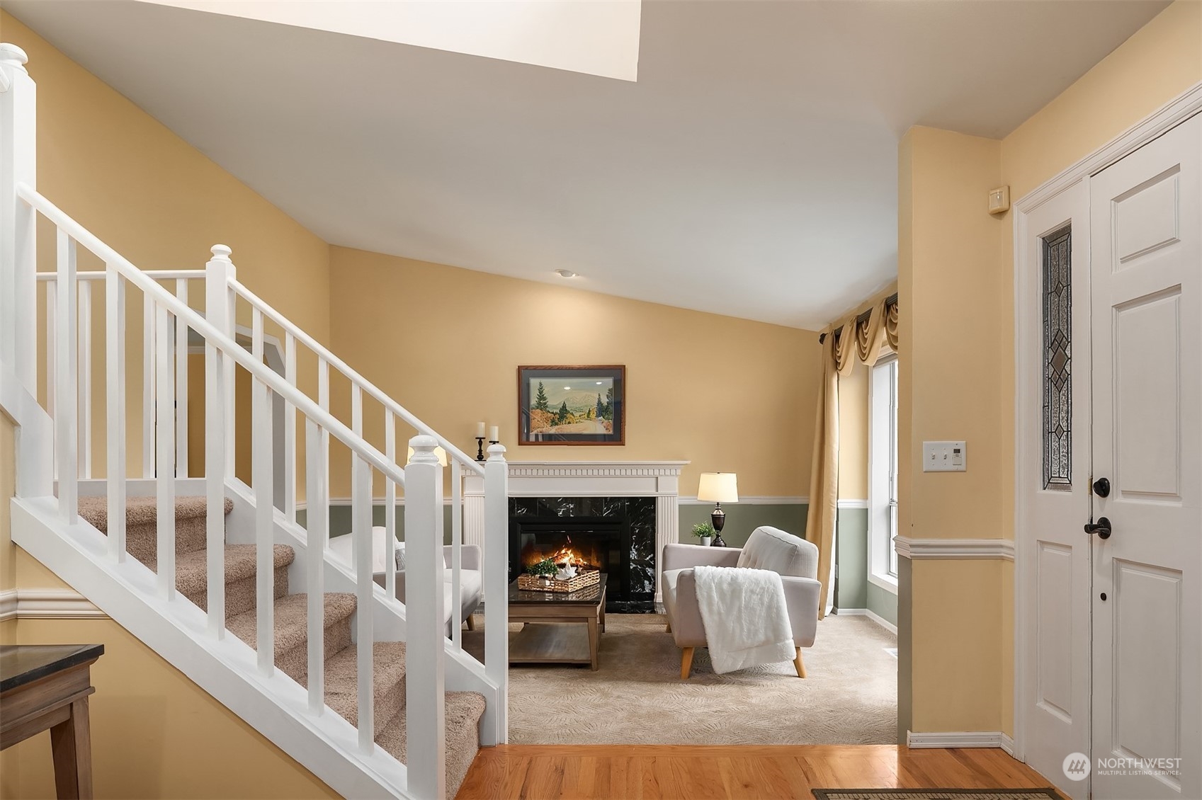 2224 237th Place Southeast Bothell, WA 98021 - Photo 4 of 40 a living room with furniture and a fireplace