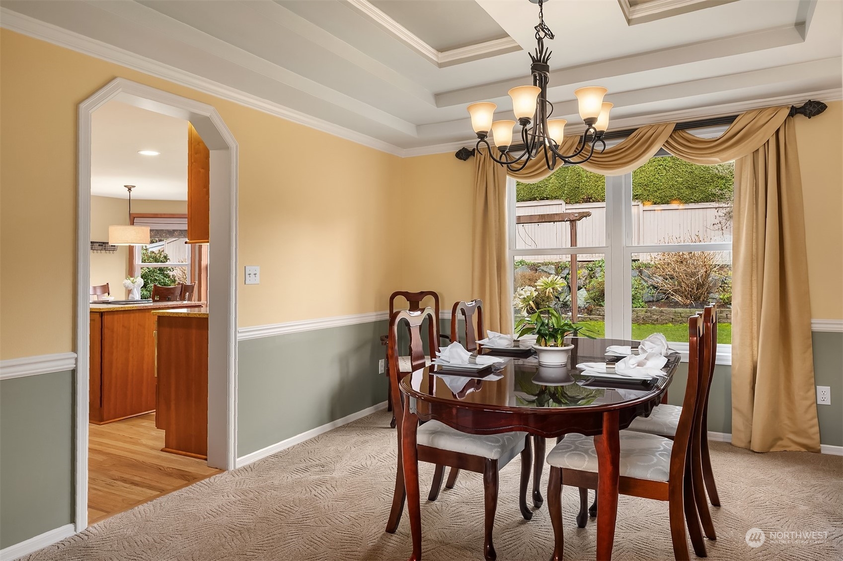 2224 237th Place Southeast Bothell, WA 98021 - Photo 10 of 40 a dining room with furniture a chandelier and a large window