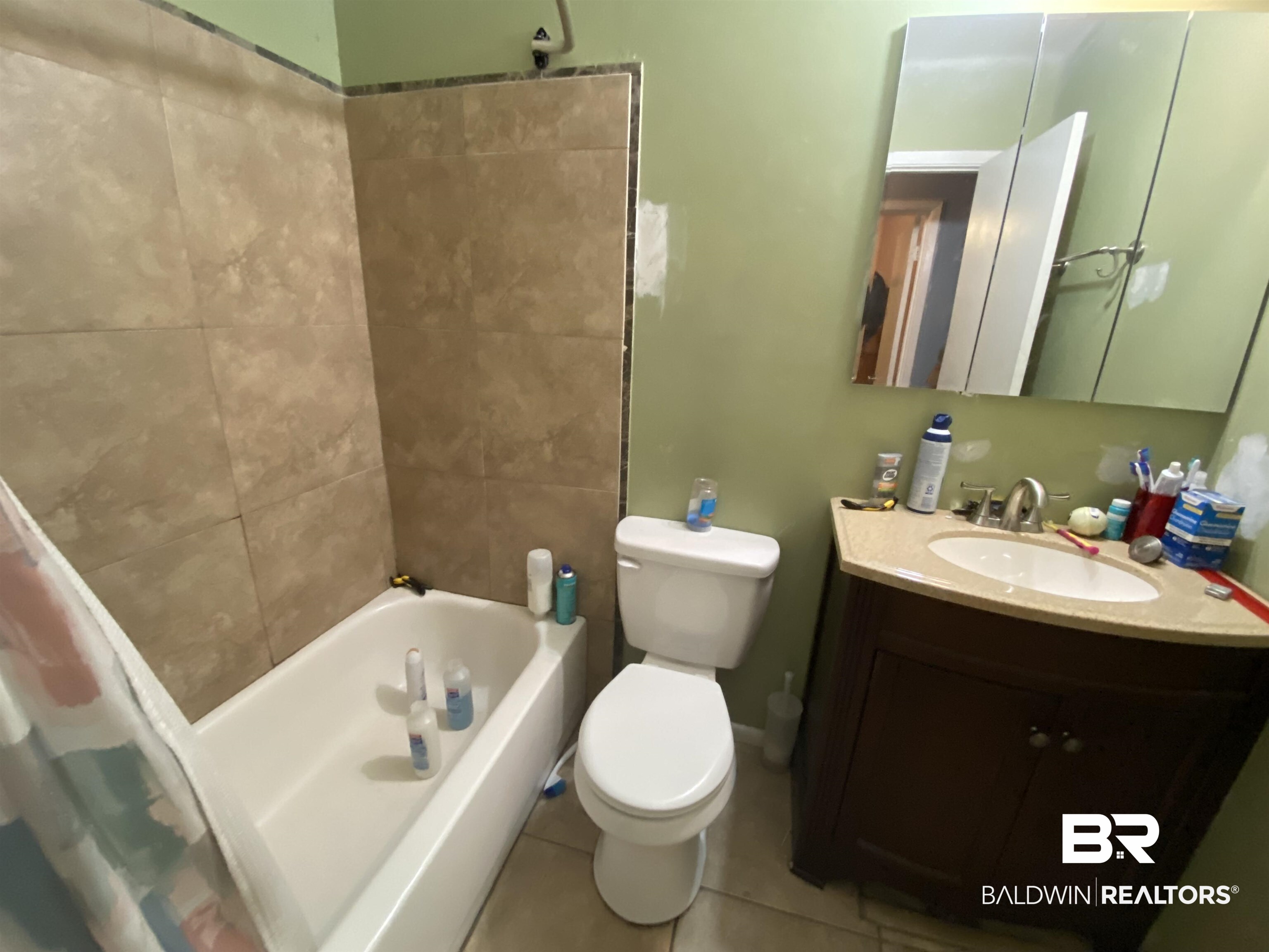 24325 Ramsey Road Fairhope, AL 36532 - Photo 7 of 16 Single Vanity, Tub w/Shower. Tile Floors