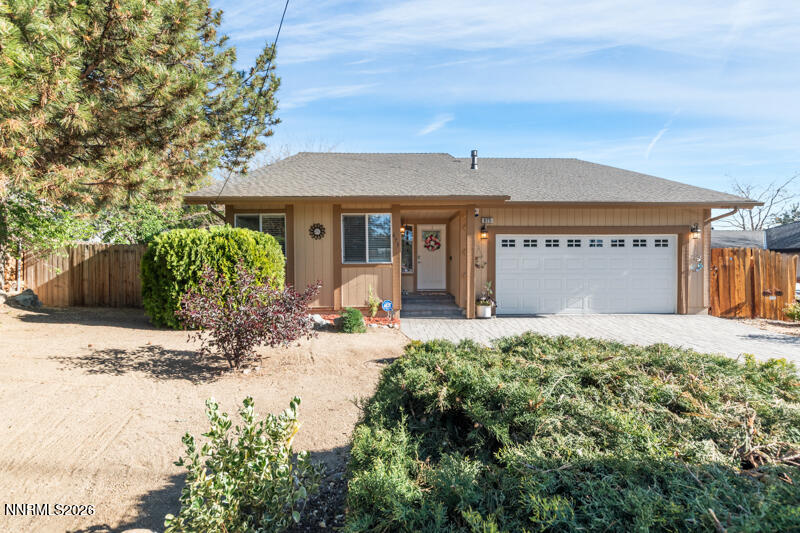 675 College Drive Reno, NV 89503 - Photo 1 of 30 a front view of a house with garden