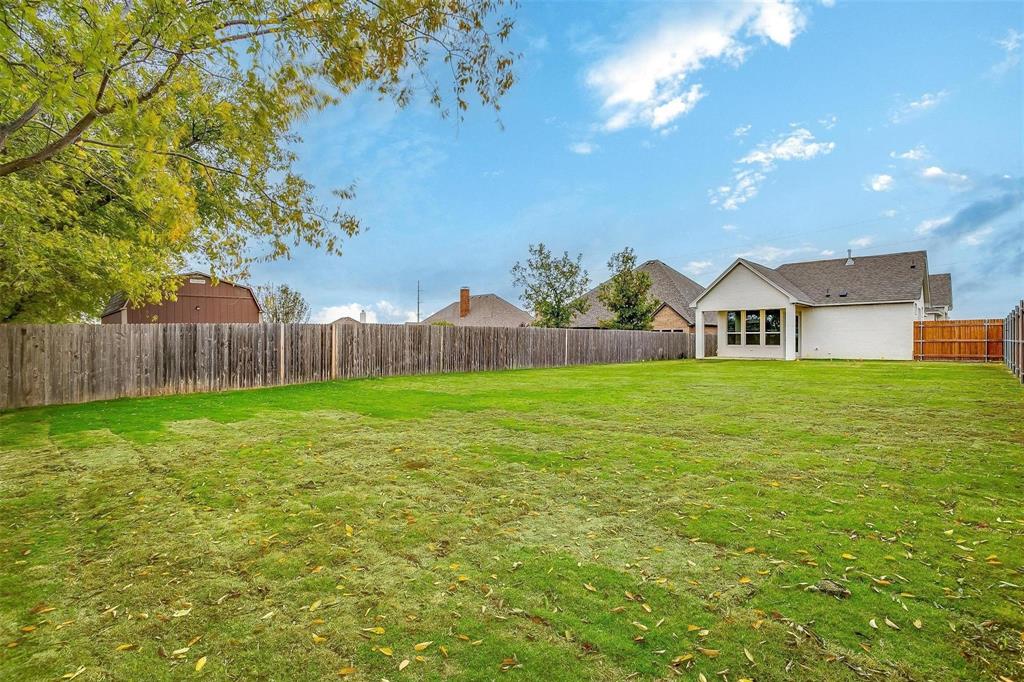 2316 Builder Road Crowley, TX 76036 - Photo 33 of 34 a view of a house with backyard and sitting area