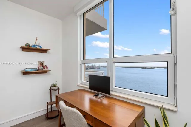 a bedroom with baby crib and a book shelf