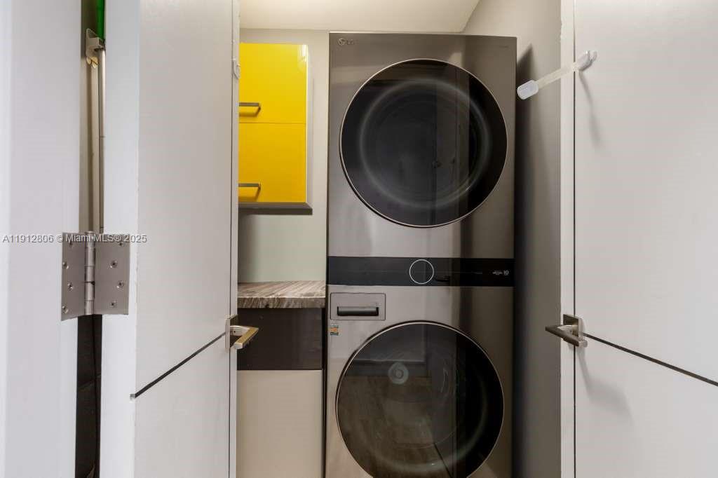 808 Brickell Key Drive, Unit 2504 Miami, FL 33131 - Photo 25 of 26 a close up view of a washer and dryer