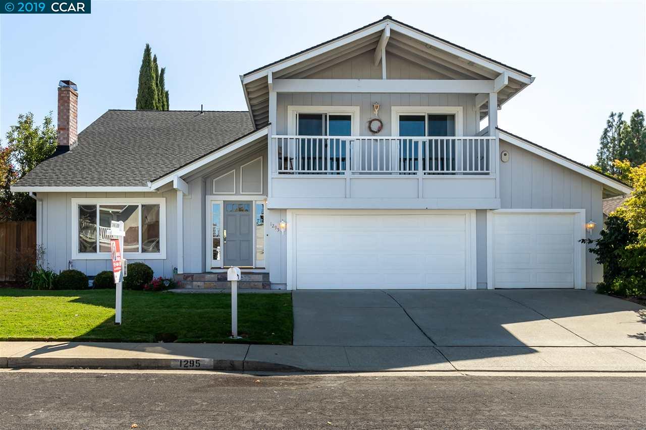1295 Waterfall Way Concord, CA 94521 - Photo 1 of 1 a front view of a house with a yard