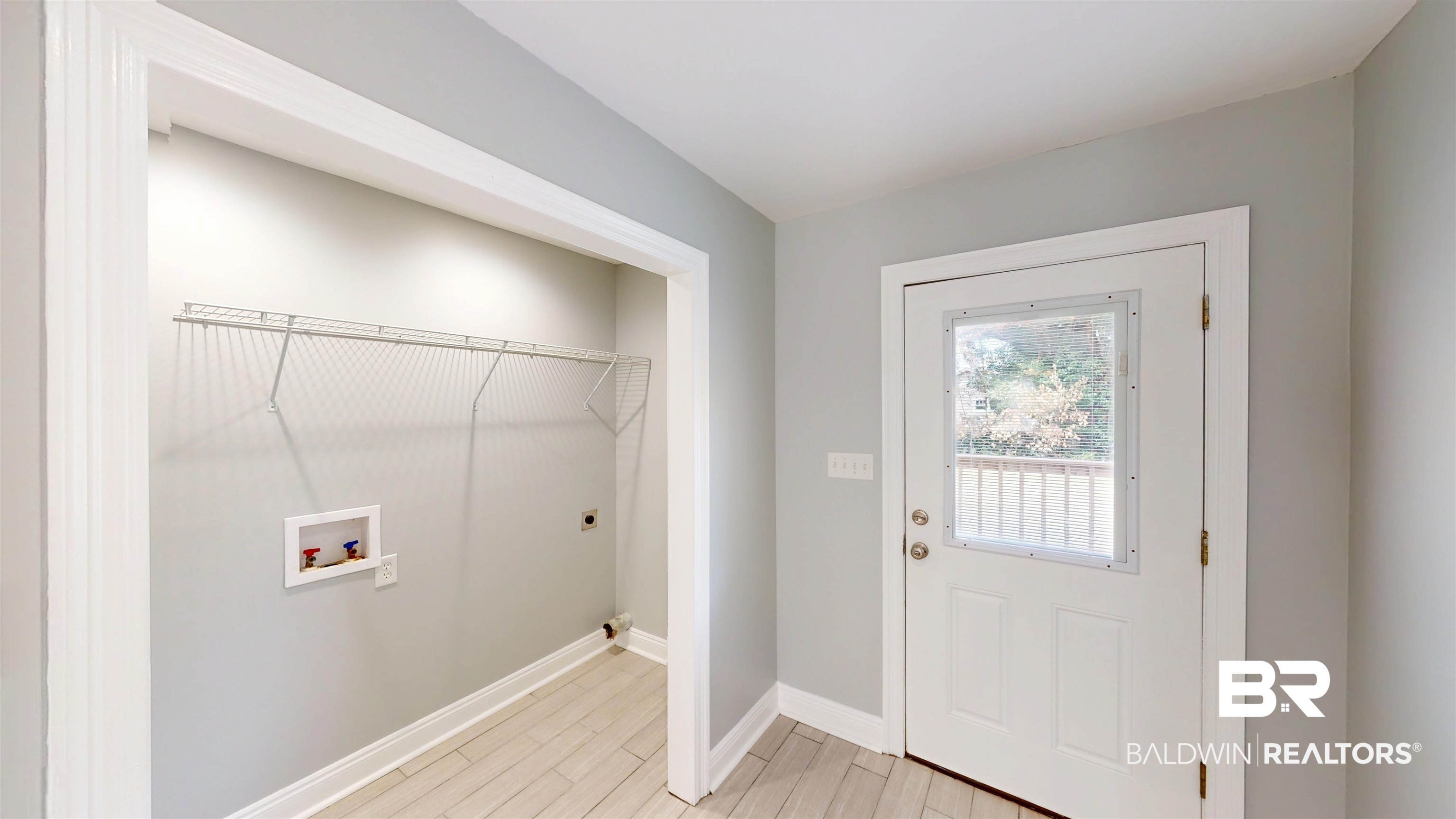 2454 Taylor Avenue Mobile, AL 36606 - Photo 12 of 24 Laundry area with light wood-style floors, washer hookup, and hookup for an electric dryer