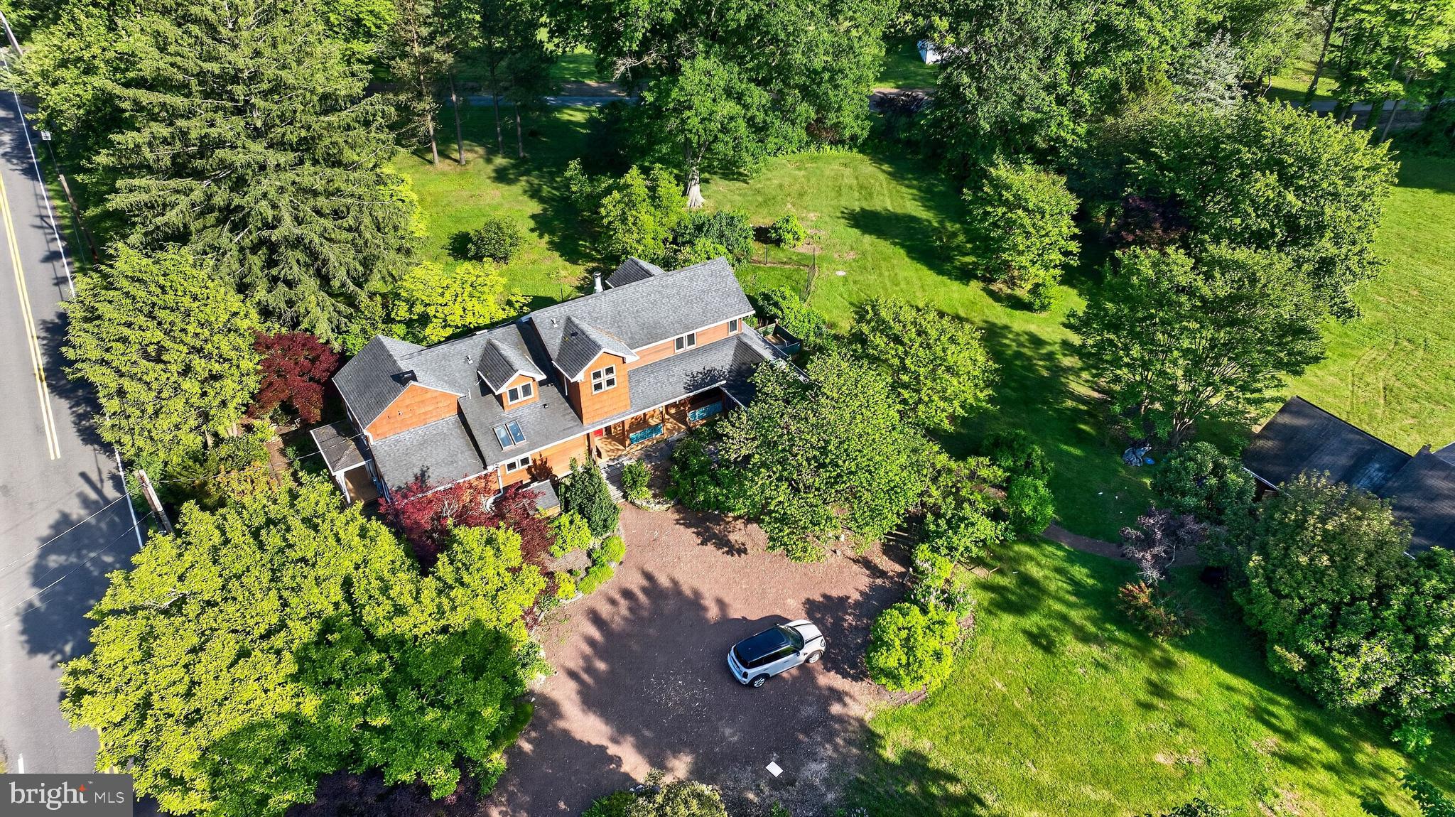 498 Perrineville Road Robbinsville, NJ 08691 - Photo 46 of 59 an aerial view of a house with garden space and street view