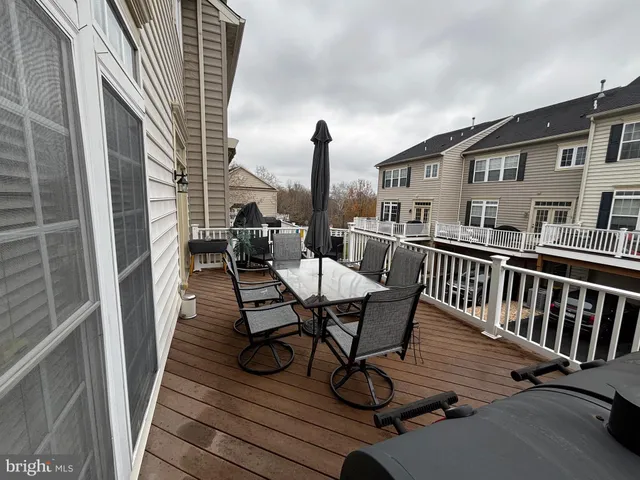 a view of a balcony with chairs