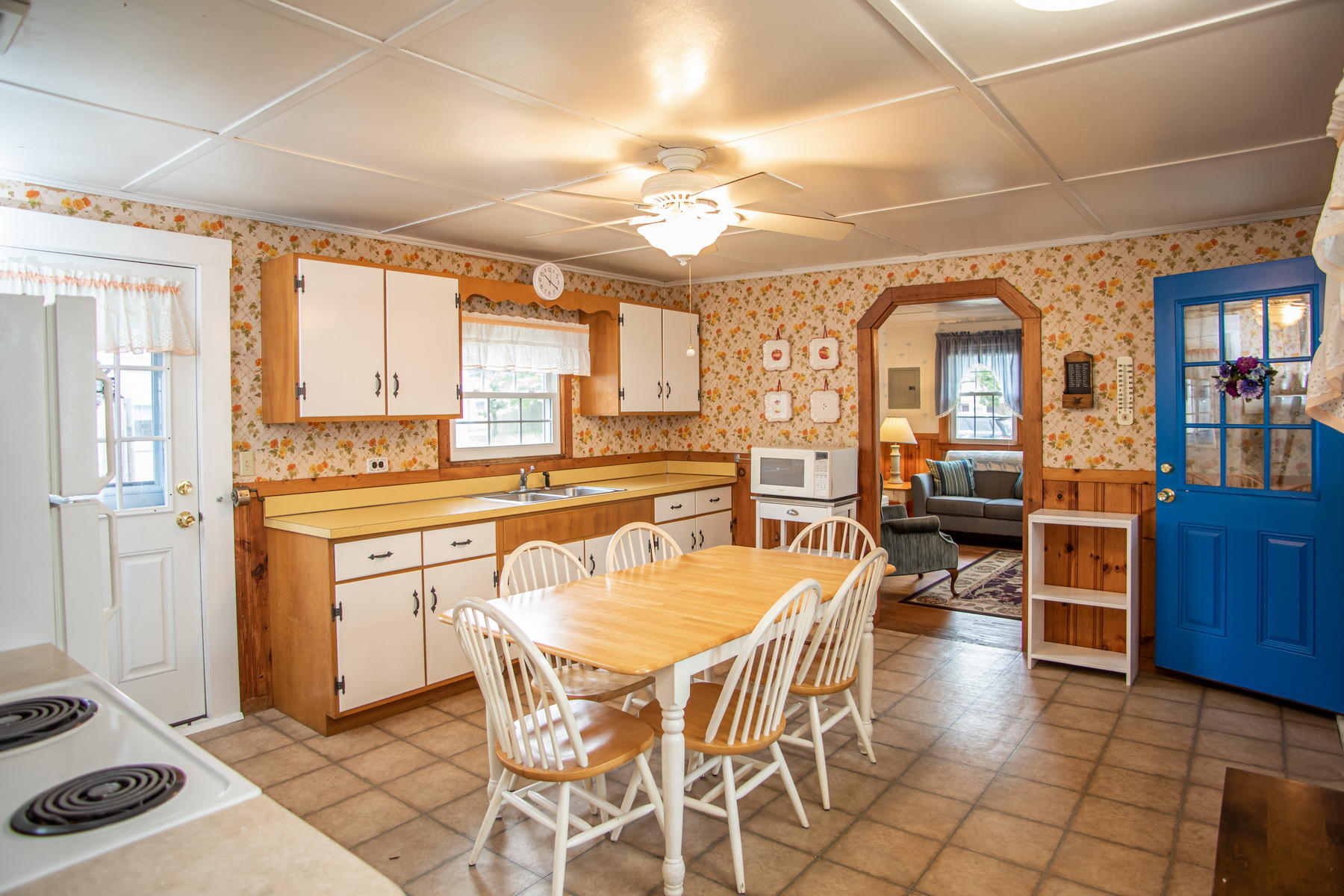 73 Uncle Rolf Road Dennis Port, MA 02639 - Photo 12 of 23 a view of a dining room with furniture and chandelier