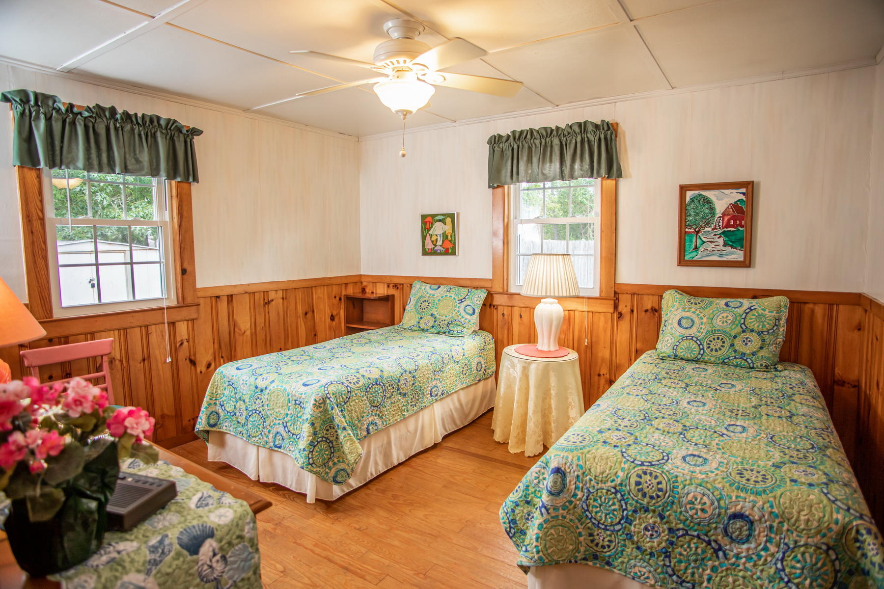 73 Uncle Rolf Road Dennis Port, MA 02639 - Photo 15 of 23 a bedroom with two beds and a chandelier