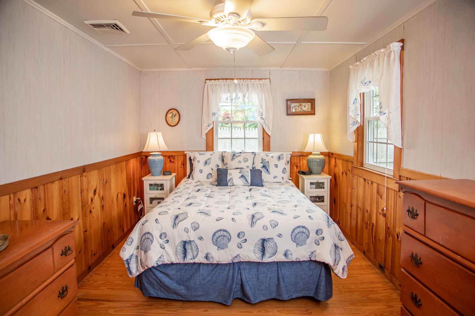 73 Uncle Rolf Road Dennis Port, MA 02639 - Photo 16 of 23 a bedroom with a bed mirror and a window