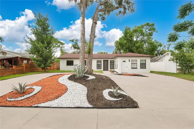 front view of a house with a yard