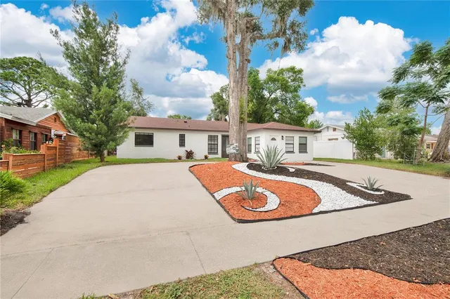 a view of house with outdoor space and street view
