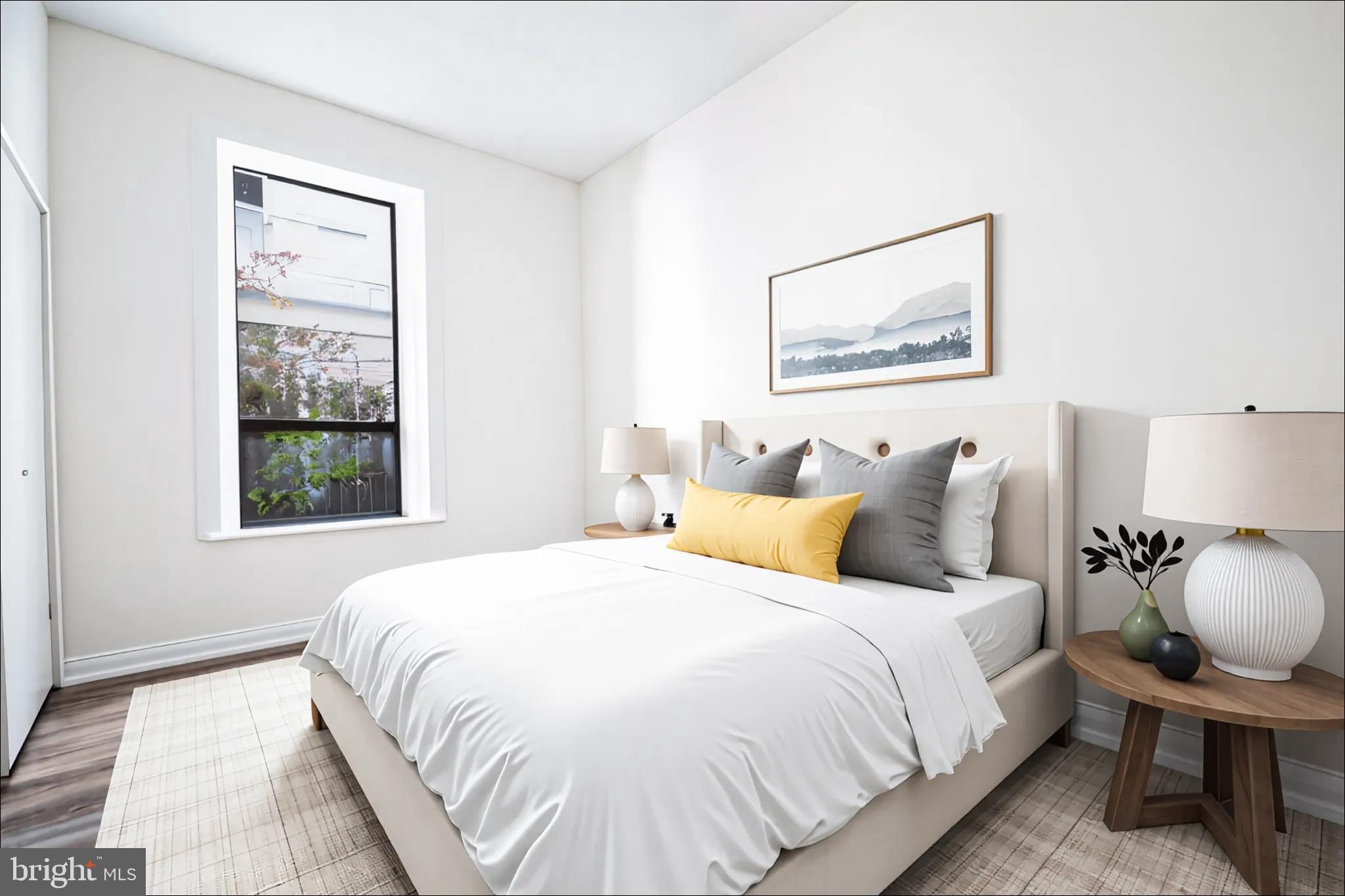 1669 Columbia Road Northwest, Unit 109 Washington, DC 20009 - Photo 10 of 35 a bedroom with bed and window