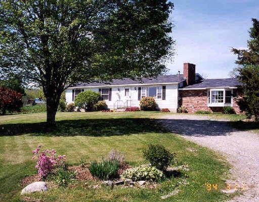 41 College Farms Road Warren, CT 06777 - Photo 1 of 1 a front view of a house with a yard