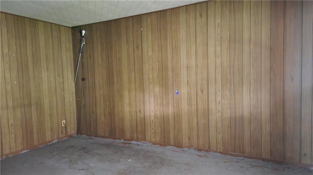 1116 Grant Street Vandergrift, PA 15690 - Photo 3 of 10 a view of a elevator with wooden walls
