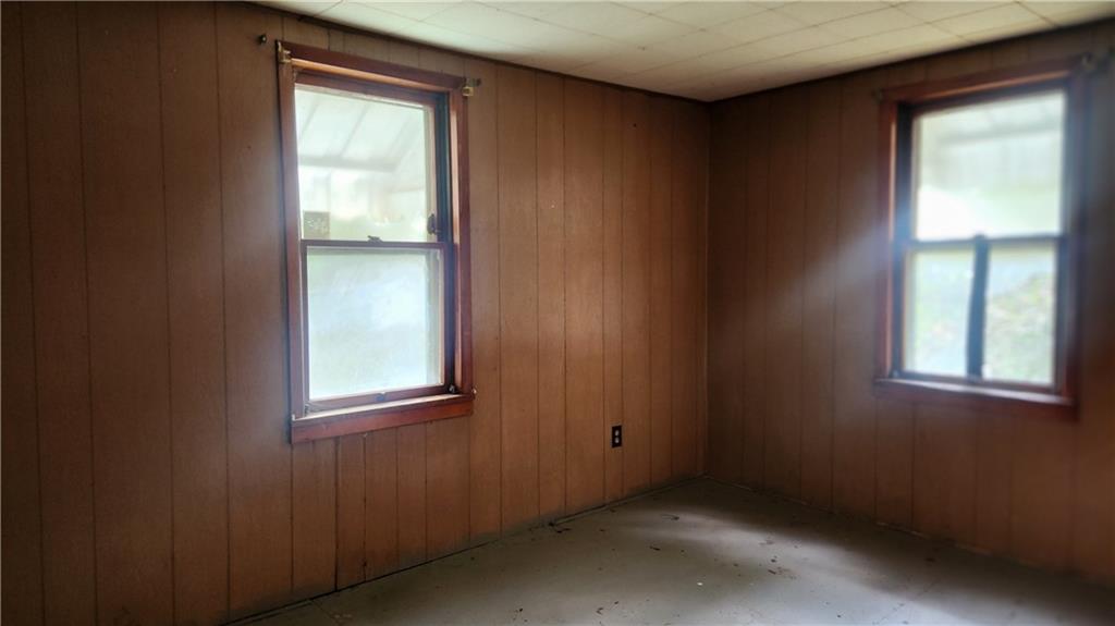 1116 Grant Street Vandergrift, PA 15690 - Photo 7 of 10 an empty room with windows