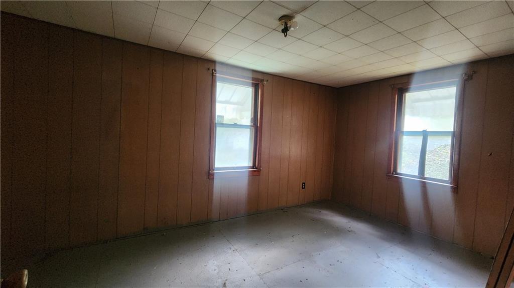 1116 Grant Street Vandergrift, PA 15690 - Photo 8 of 10 an empty room with windows