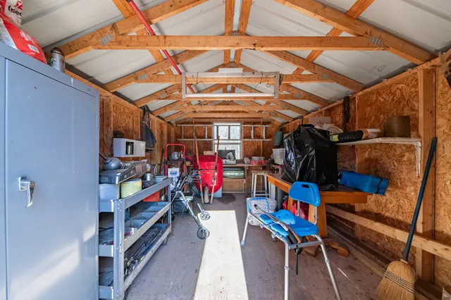 a front view of a house with garden and porch