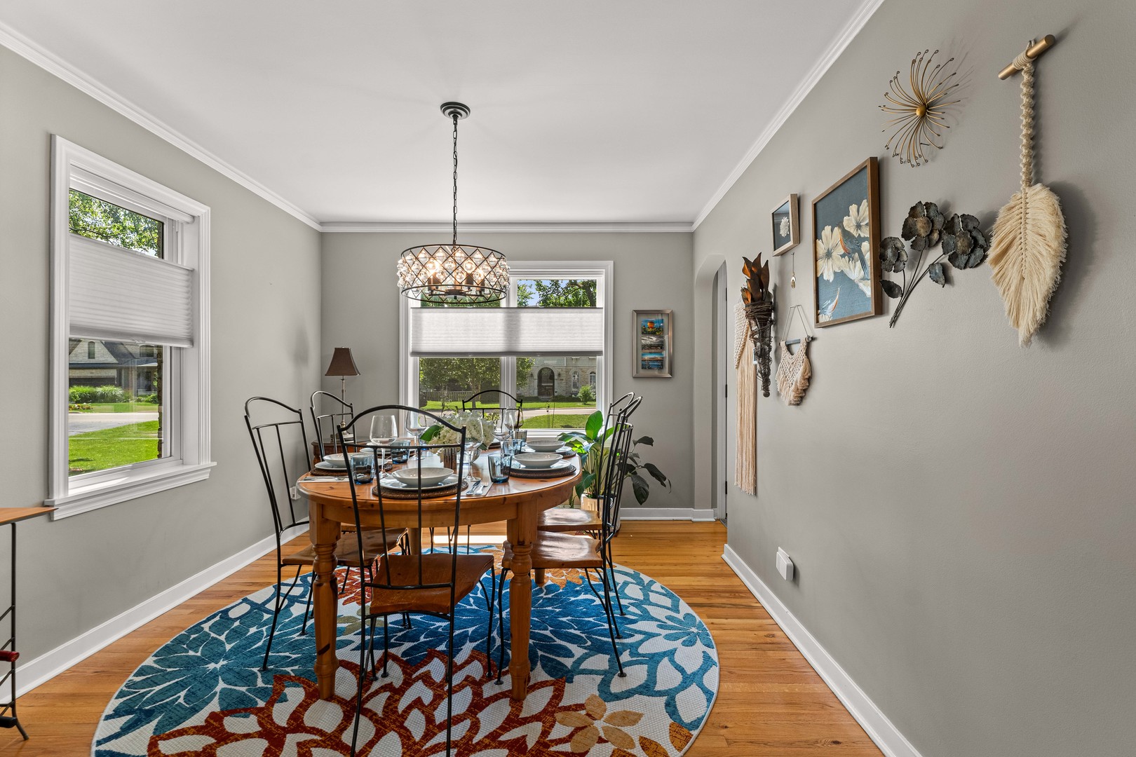 725 North County Line Road Hinsdale, IL 60521 - Photo 21 of 34 a dining room with furniture a rug and wooden floor