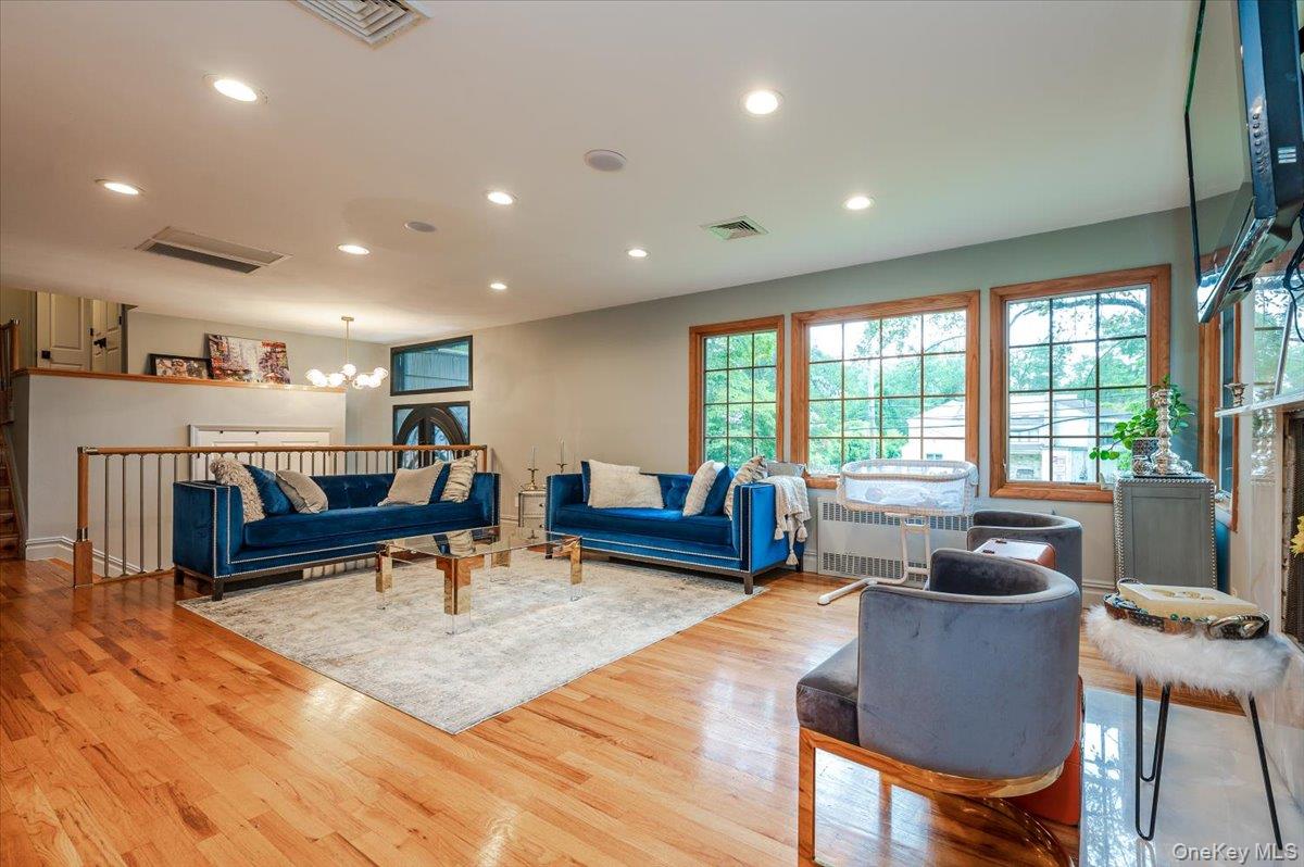 26 Redbrook Road Great Neck, NY 11024 - Photo 3 of 19 a living room with furniture and a table