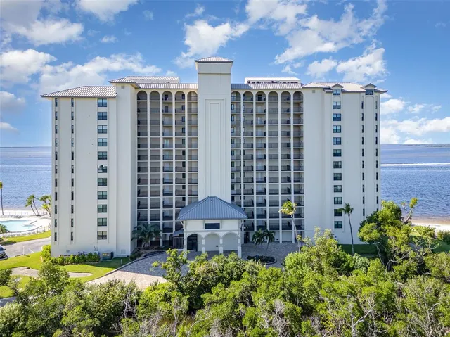 a backyard of a multi story building