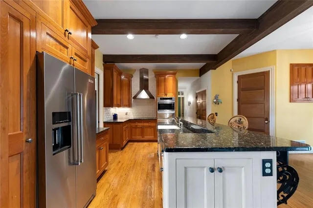 a view of a kitchen and dining room