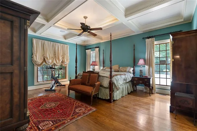 a bathroom with a sink a toilet and a shower