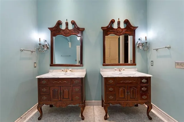 a bathroom with a toilet sink and shower