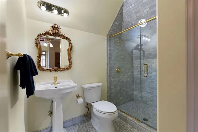 a living room with a couch and wooden floor