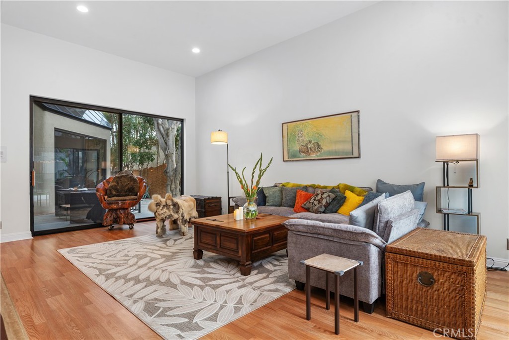 341 S Meadows Manhattan Beach, CA 90266 - Photo 14 of 50 a living room with furniture and a lamp