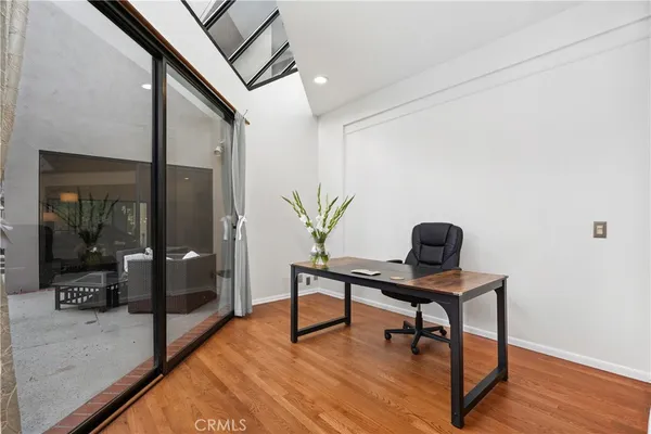 a view of a hallway with workspace