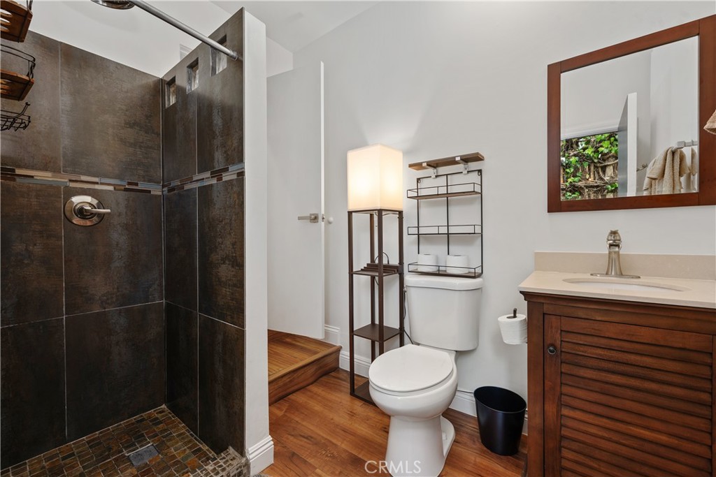 341 S Meadows Manhattan Beach, CA 90266 - Photo 19 of 50 a bathroom with a toilet a sink and shower