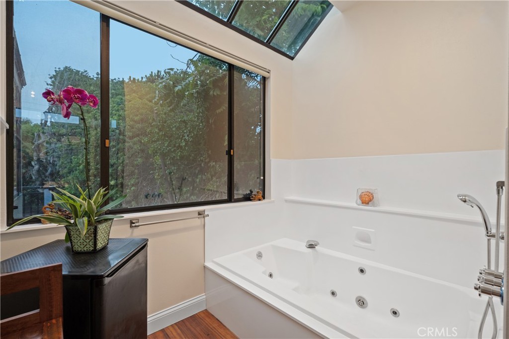 341 S Meadows Manhattan Beach, CA 90266 - Photo 28 of 50 a white bath tub sitting next to a white sink