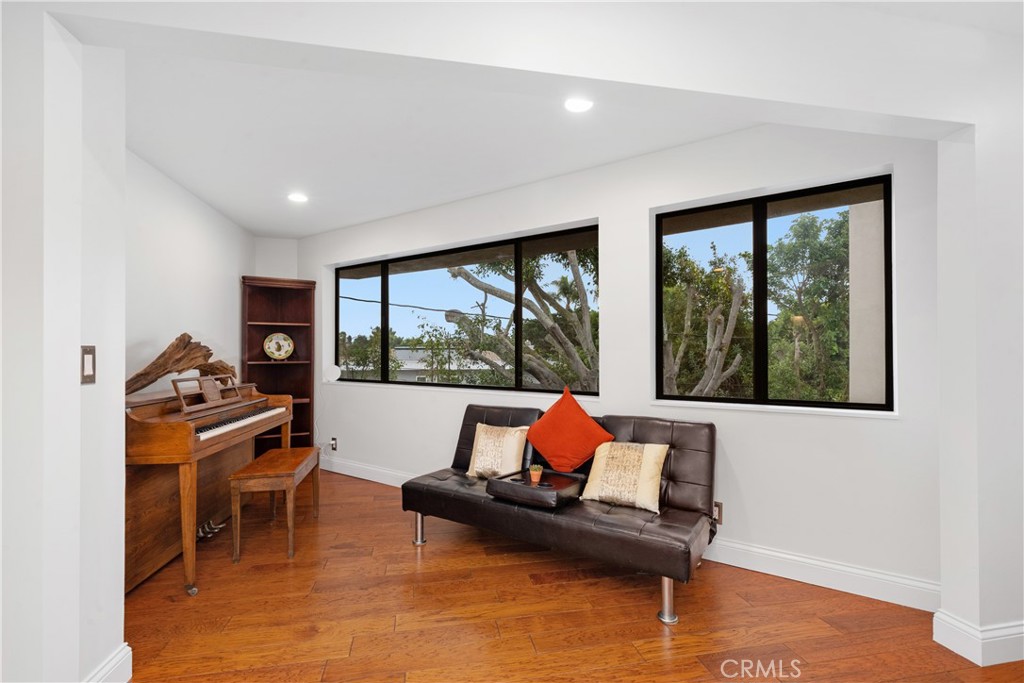 341 S Meadows Manhattan Beach, CA 90266 - Photo 32 of 50 a living room with furniture and a large window