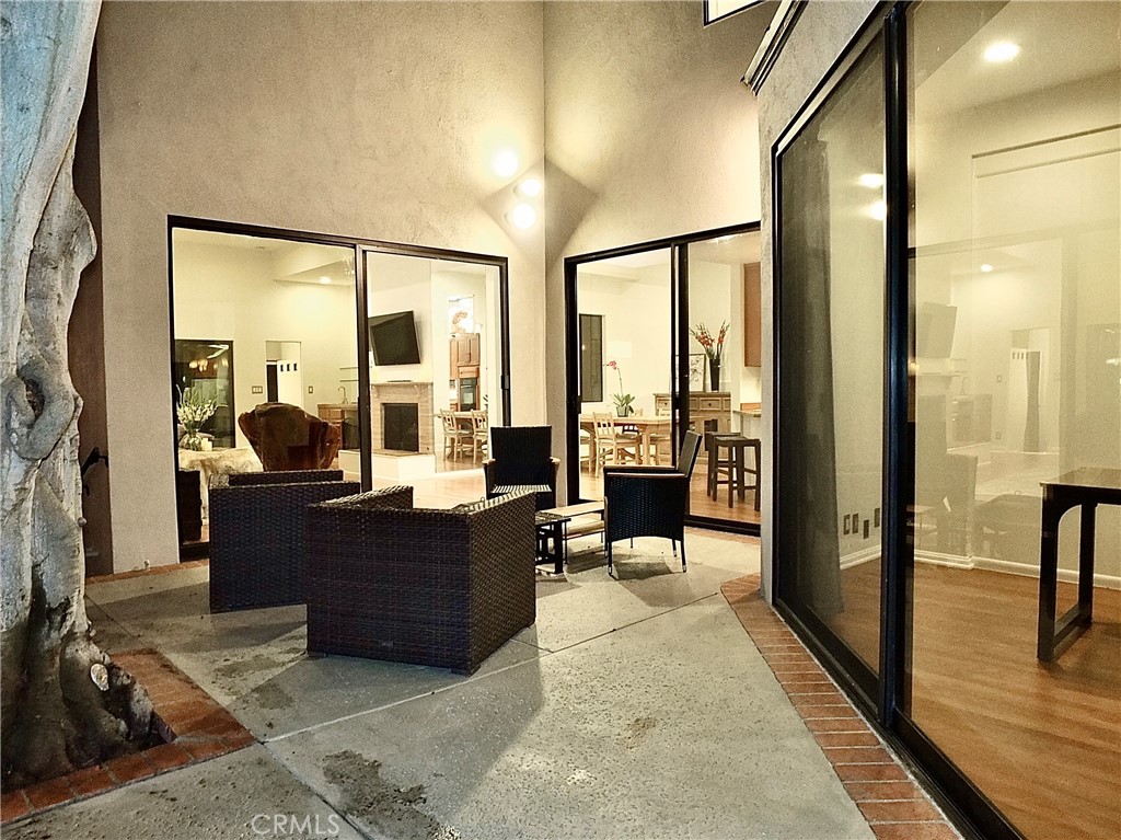341 S Meadows Manhattan Beach, CA 90266 - Photo 39 of 50 a living room with furniture and a large window