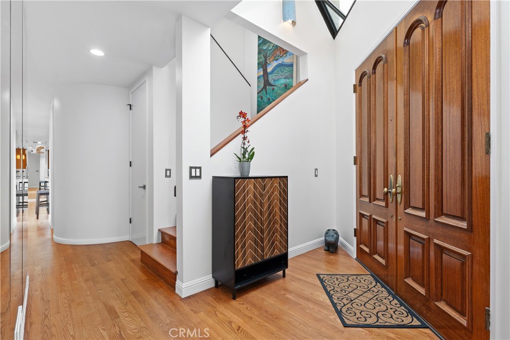 341 S Meadows Manhattan Beach, CA 90266 - Photo 5 of 50 a view of entryway with wooden floor and stairs