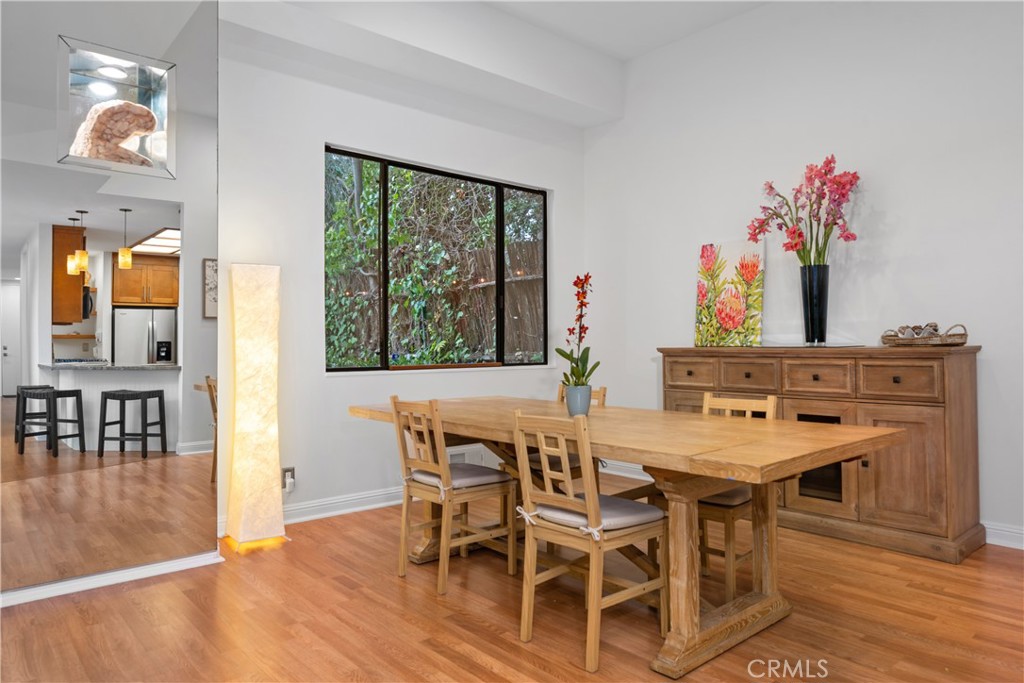 341 S Meadows Manhattan Beach, CA 90266 - Photo 10 of 50 a view of a dining room with furniture window and wooden floor