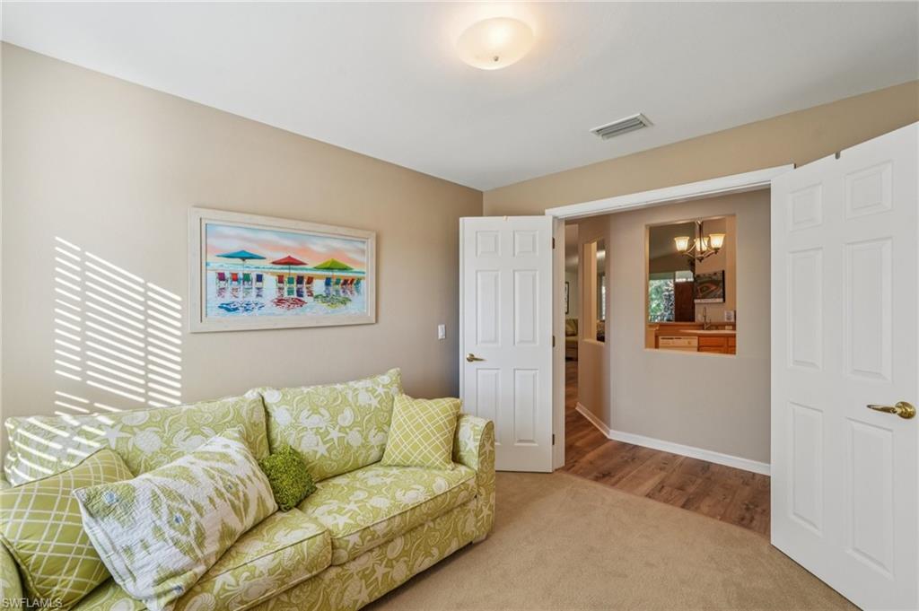 9583 Hemingway Lane, Unit 4309 Fort Myers, FL 33913 - Photo 6 of 18 a living room with furniture and a window