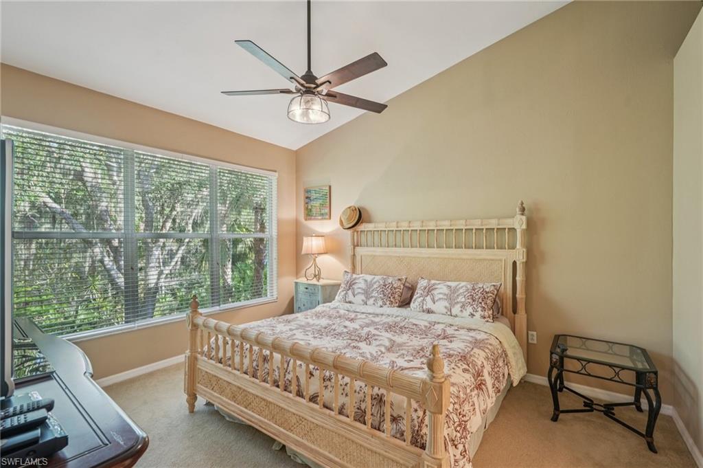 9583 Hemingway Lane, Unit 4309 Fort Myers, FL 33913 - Photo 8 of 18 a bedroom with a bed and a window