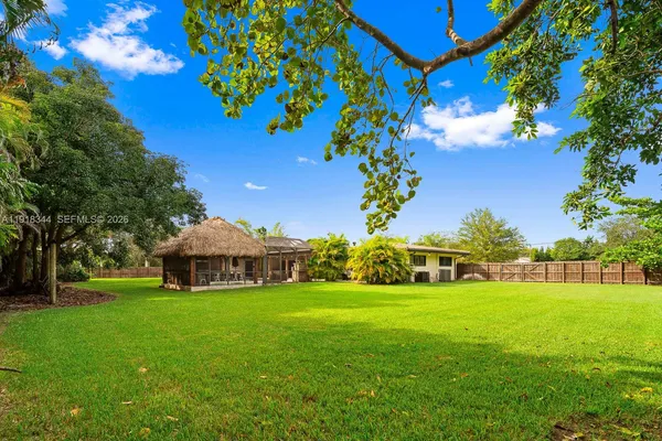 a view of a house with a big yard